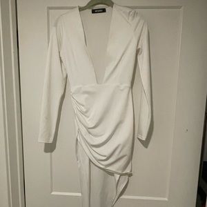 White long sleeve low cut v-neck dress.
